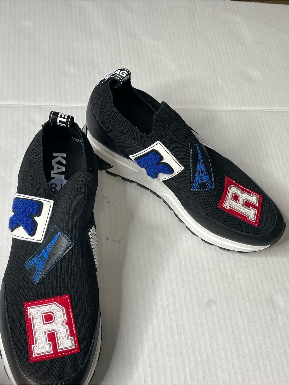 Karl Lagerfeld Black Sneakers with Blue and Red Accents size: 8.5